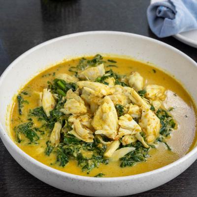 Jumbo lump-crab meat and kale in a creamy coconut yellow curry sauce.