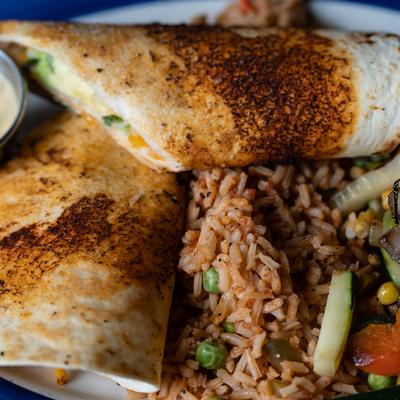 Pepper Jack Chicken Enchiladas and rice.