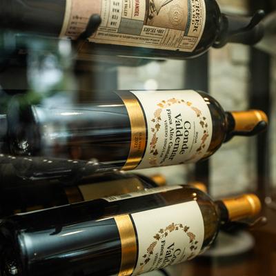 Bottles of wine are elegantly displayed in a wine rack.