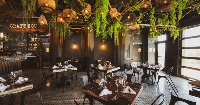 Well-lit interior with tables ready for guests