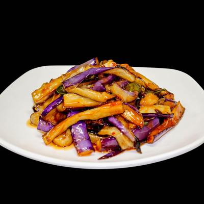 Stir fried eggplant with black fungus shoots, carrots, and bamboo in spicy sauce.