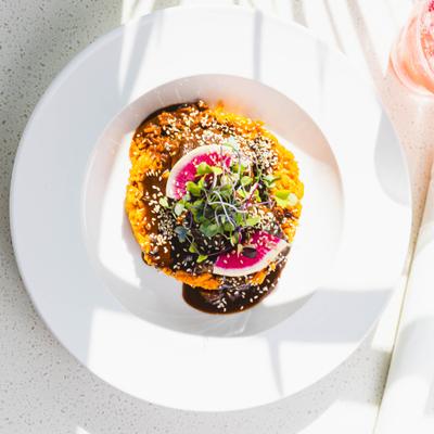 Braised beef, mole Oaxaca, roasted sesame seeds, tortillas and Mexican rice.