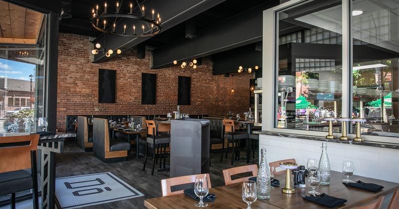 Interior space, cozy dining area with set tables