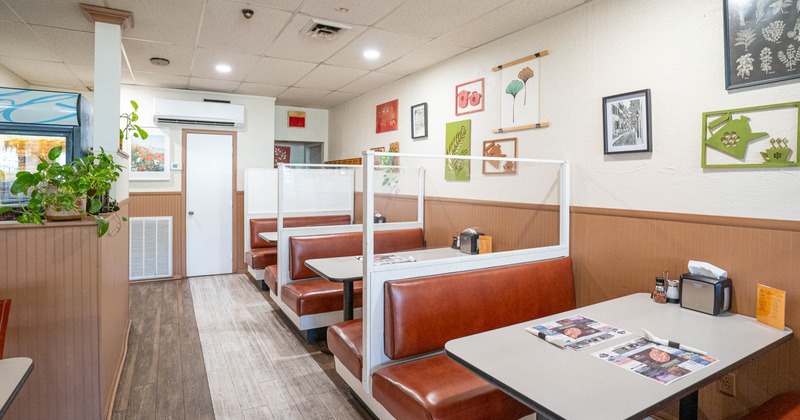 Interior of a cozy diner with brown leather booths
