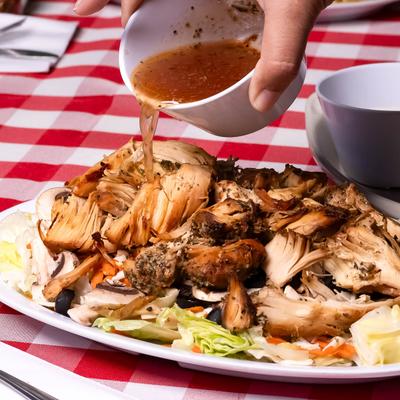 Grilled chicken salad, with dressing.