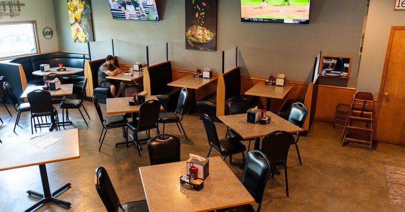 Interior, tables and chairs ready for guests