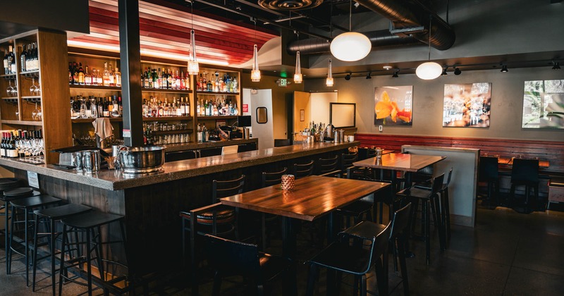 Interior, bar area, tables, bar stools and chairs