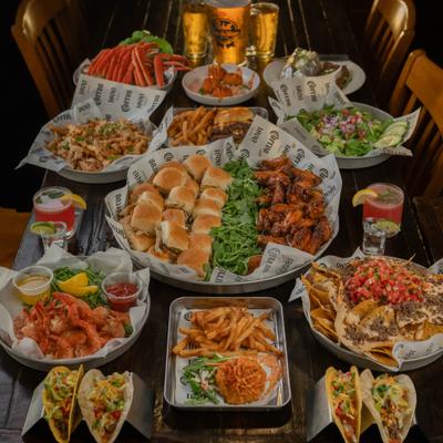 Table Full of Assorted Dishes.