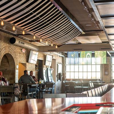 Interior, seating area, guests sitting at tables