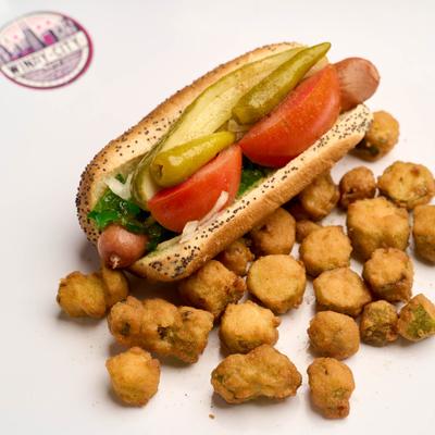 Chicago hot dog served with a side of fried okra.