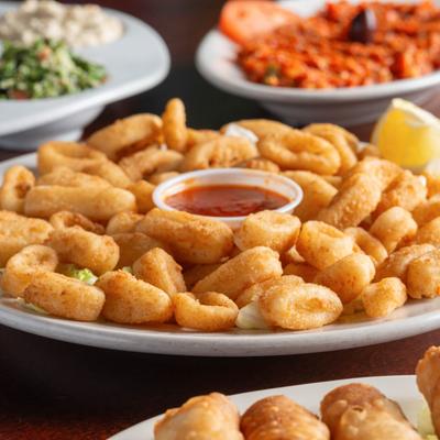 Fried calamari with marinara dipping sauce.