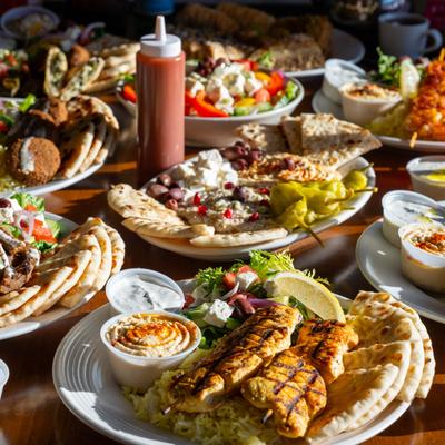 Assortment of food plates displayed on a table.