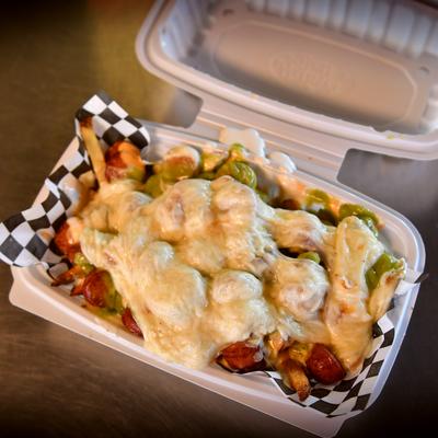 Thinly sliced pan-fried beef sausages and French fries covered with melted cheese.