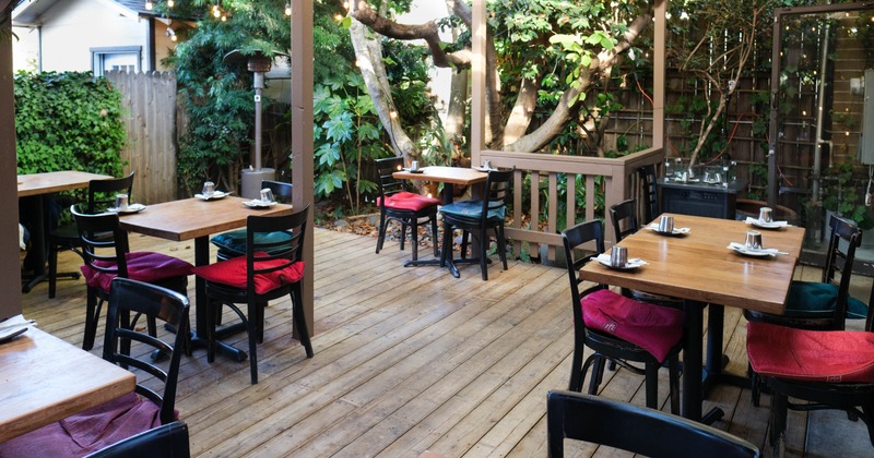 Exterior, patio, tables and chairs ready for guests