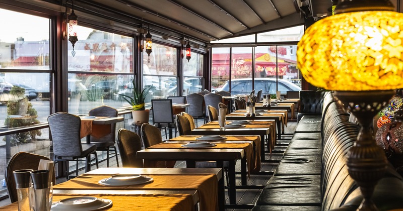 Interior, diner area, tables and chairs in line