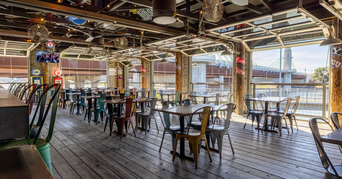Interior, seating area with tables and metal chairs