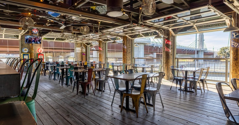 Interior, seating area with tables and metal chairs