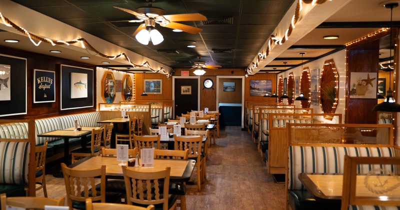 Interior, chairs and tables, restaurant booths on the side