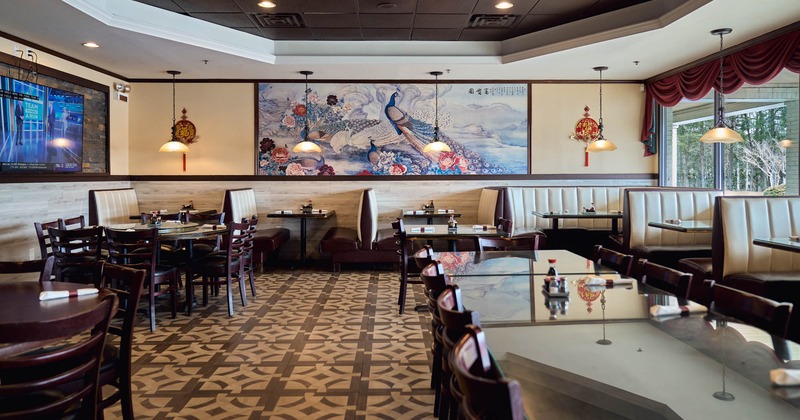 Interior, dining area, tables with chairs, ready for guests, seating booths in the back
