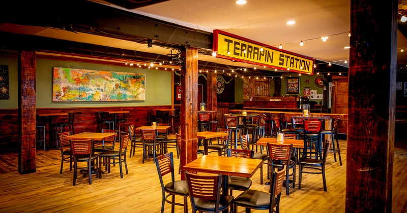 Nicely done interior seating area, tables and chairs