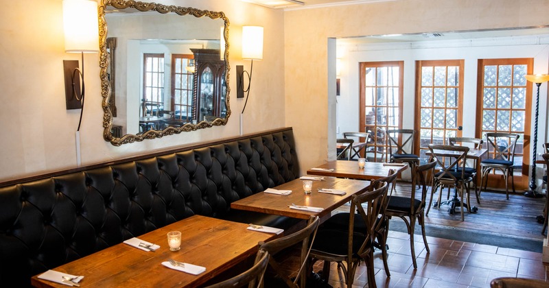 Interior, bench seating with tables and chairs