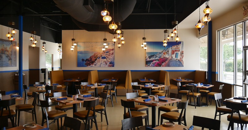 Spacious interior dining area with set dining tables