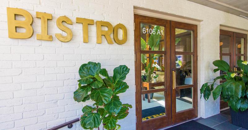 Exterior, Bistro sign on the wall and entrance