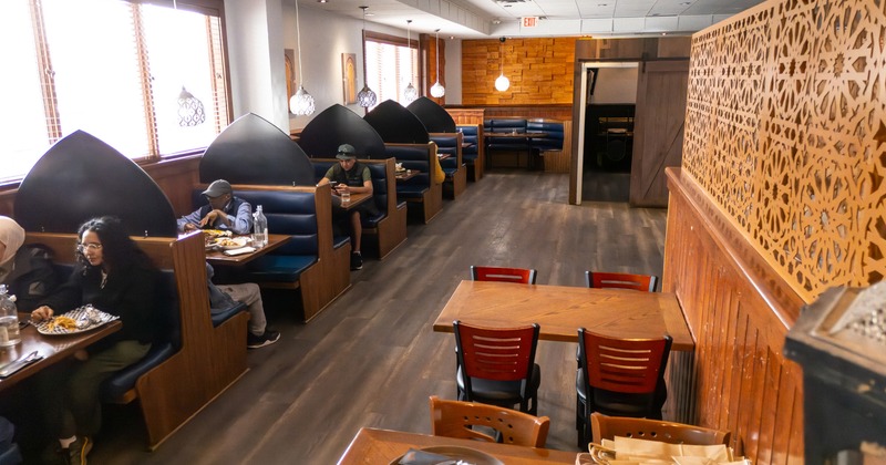 Interior space, dining area, dining booths lined up by the windows