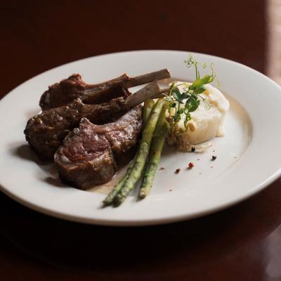 Lamb chops, mashed potatoes, and asparagus.