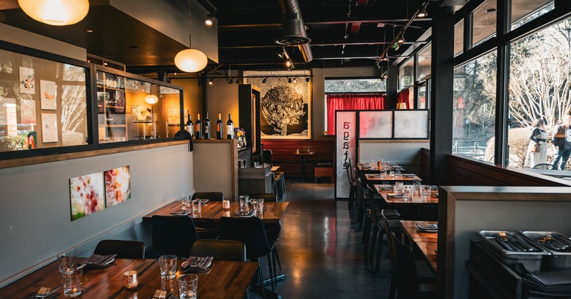 Interior, tables and chairs ready for guests