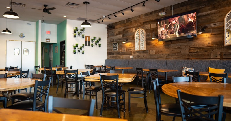 Restaurant interior, dining area, tables and chairs