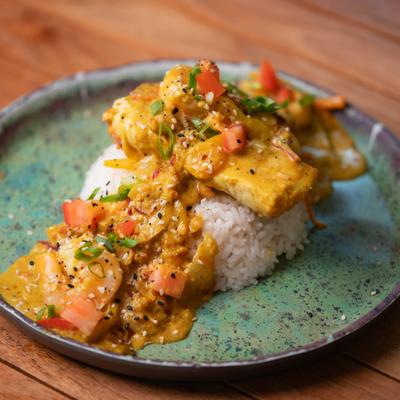 Coconut curry ono and shrimp served over rice.