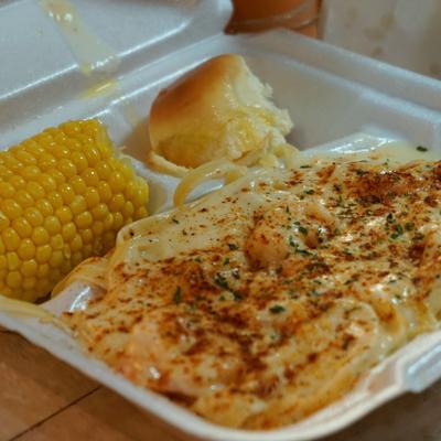 Chicken alfredo with corn.