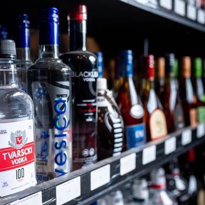 A selection of vodka bottles on a store shelf.