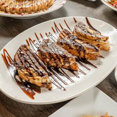 French toast with cream and chocolate sauce