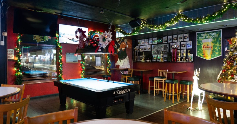 Interior, a pool table in the middle