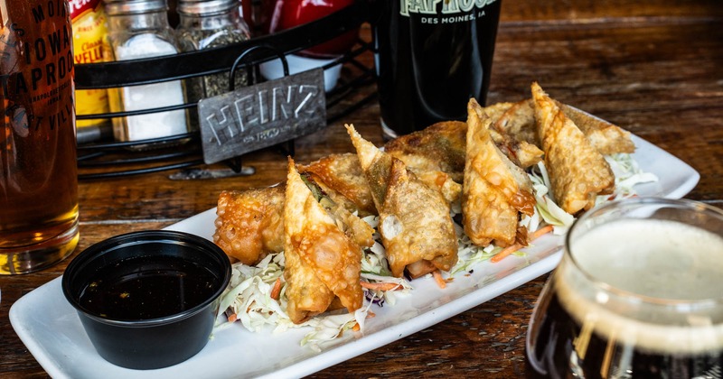 Cheese Steak Egg  Rolls served with honey sriracha