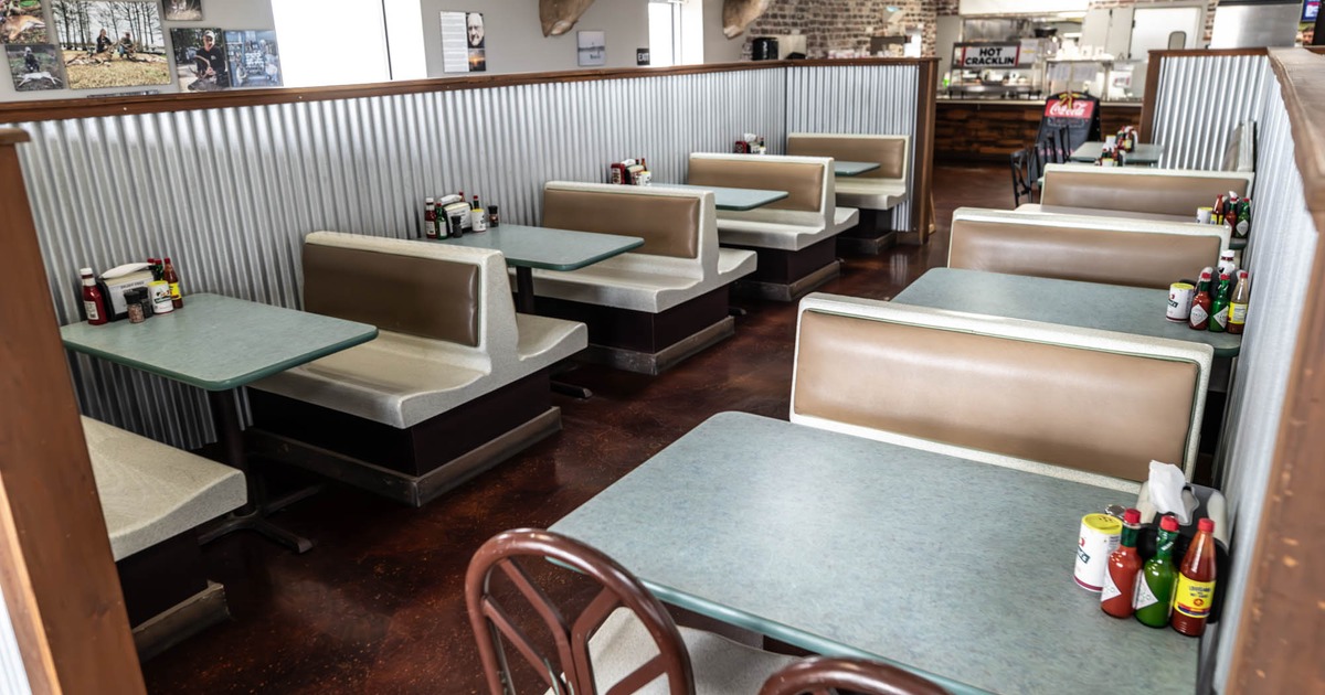 Interior seating area with double booths and tables