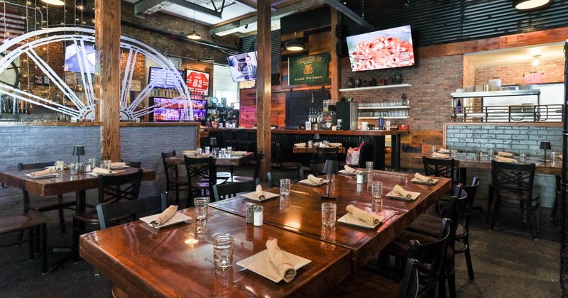 Interior, dining area, massive wooden top tables with chairs, ready for guests