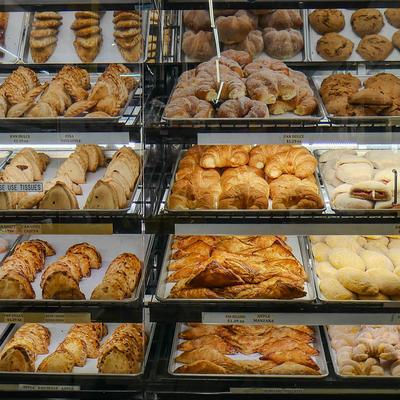 Assorted pastries in a glass display.