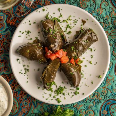 Dolmatos, served on a plate, top view.
