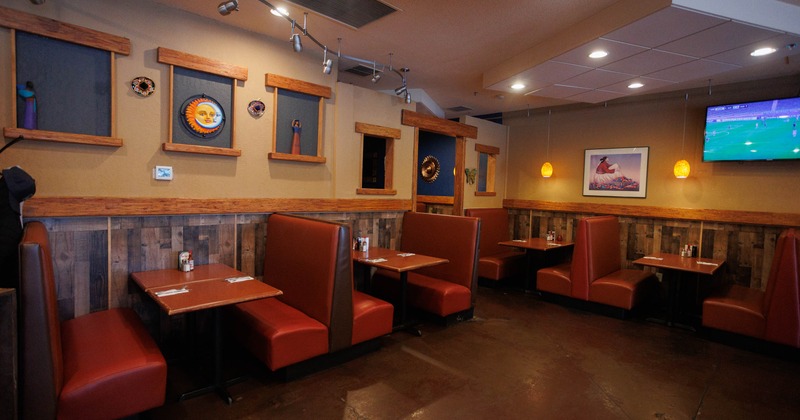 Interior, booths with chairs along the wall