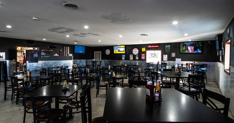 Interior seating area with tables and chairs