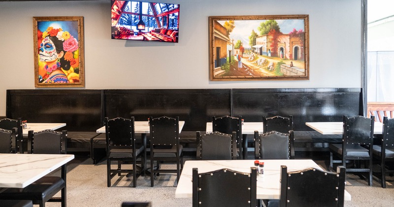 Interior, tables and chairs ready for guests