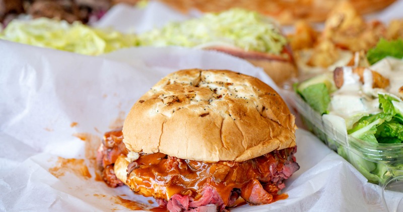 Super beef sandwich with other menu dishes