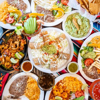 Assorted Mexican dishes and drinks.