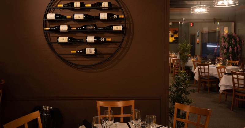 Dining table next to the wine wall