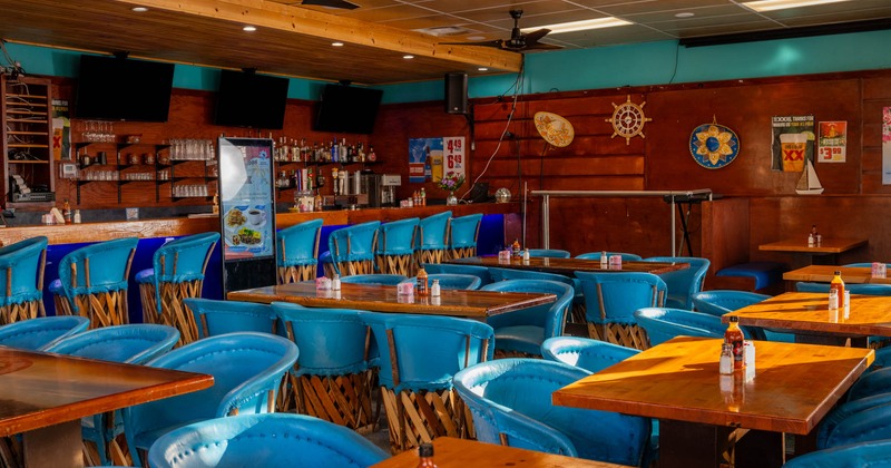 Interior, seating area with tables and chairs