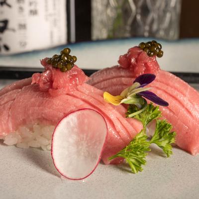 Fatty tuna on a bed of rice.