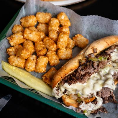 Philly Cheesesteak with tater tots.